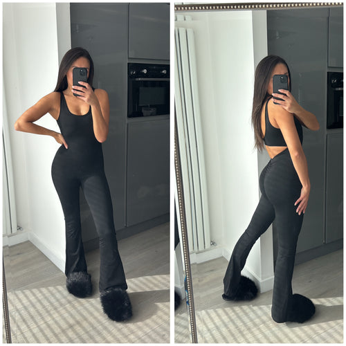 Khloe ruched bum cut out back flare leg jumpsuit - black